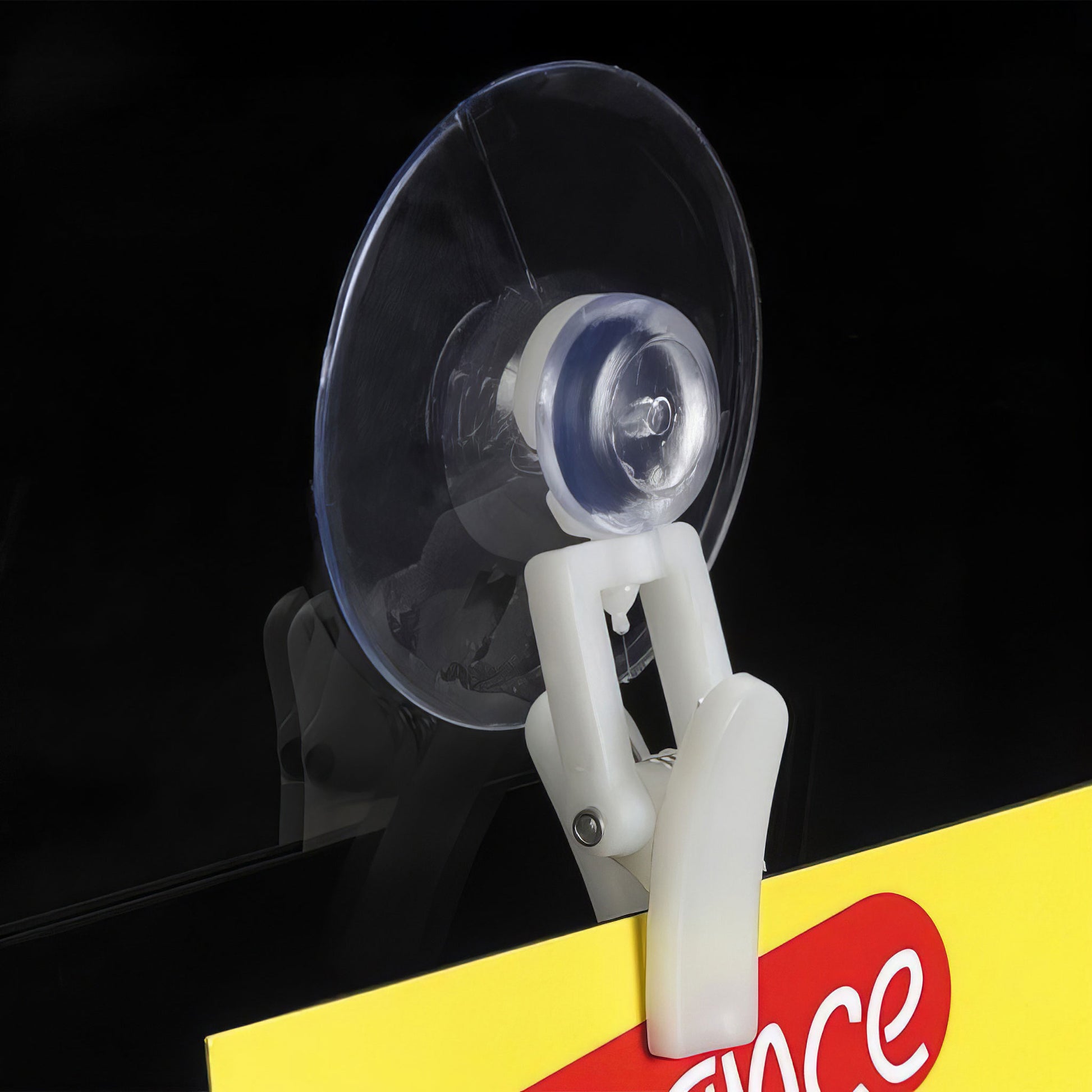 Suction cup with clip to display foam board in window