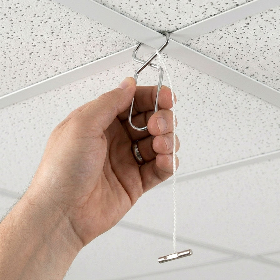 Ceiling clip for hanging foam boards with drilled holes